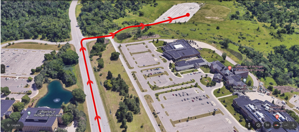 Zoomed in aerial map of East Medical Campus highlighting the route towards the rear of the campus for parking.